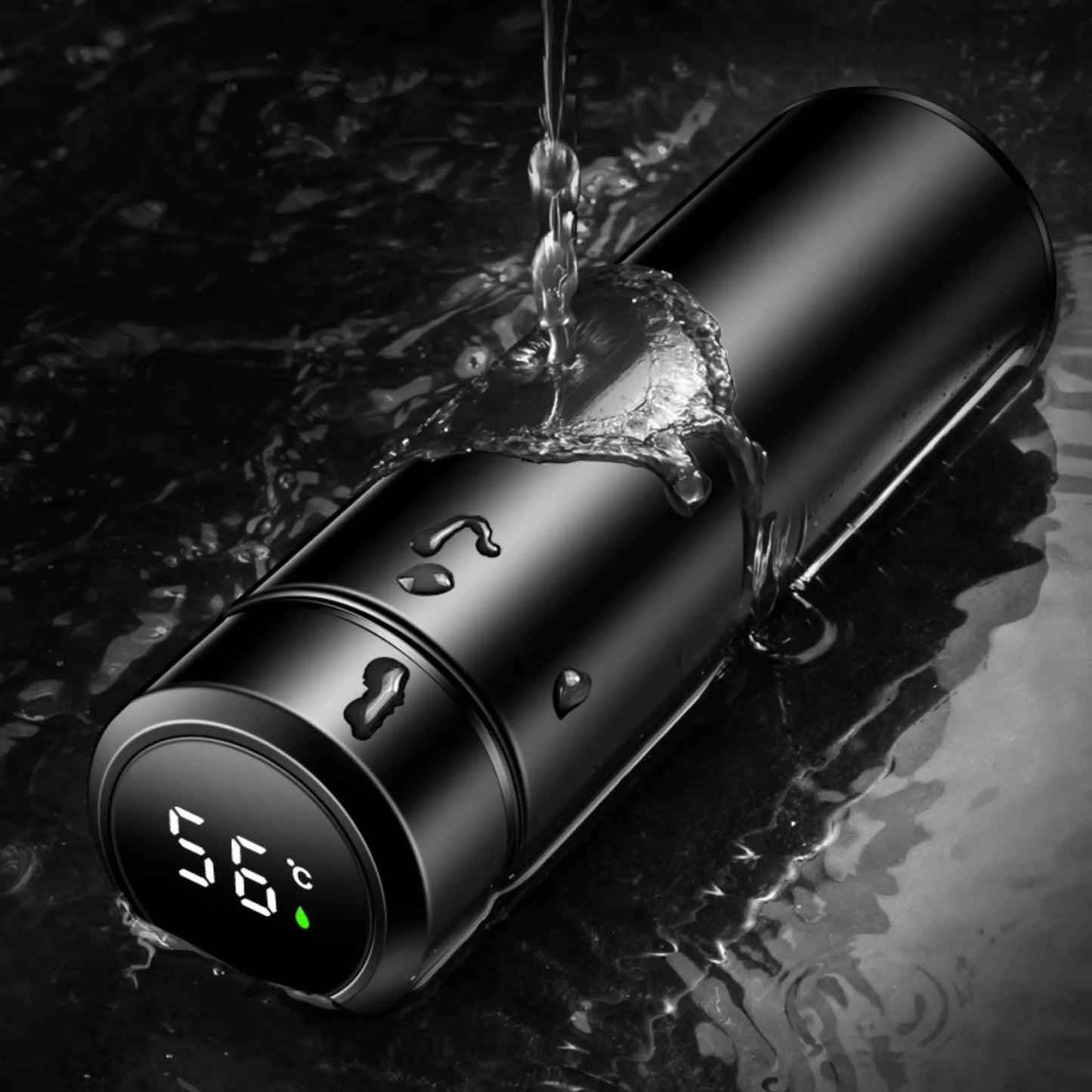 Black water bottle with digital temperature display being filled with water on a dark background